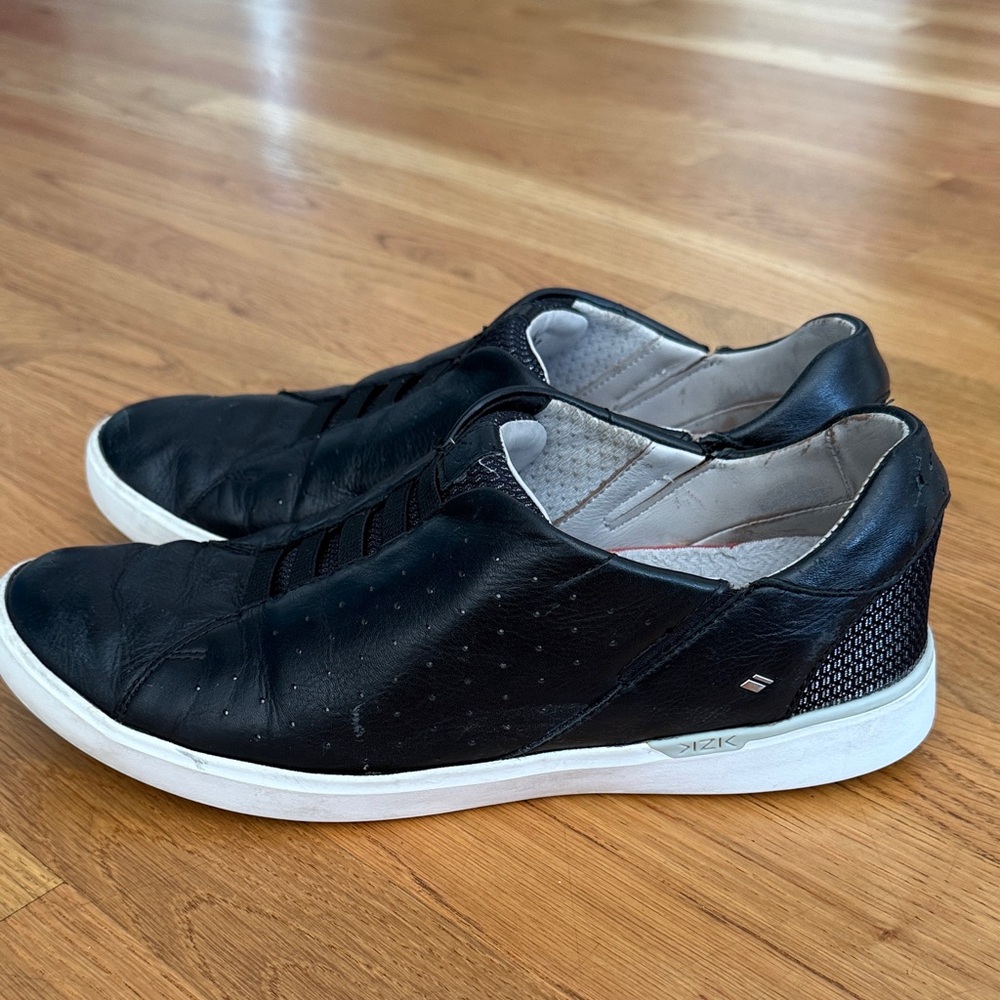 Kizik black leather slip on shoes